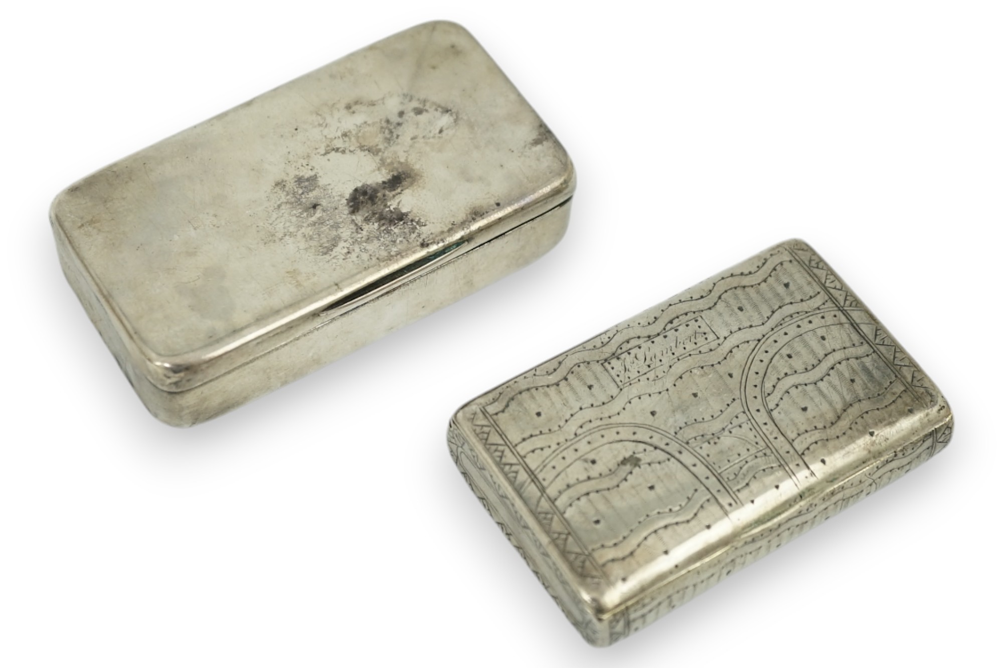 A George III silver snuff box, maker's mark rubbed, London, 1807, 74mm, together with an early 19th century Russian 84 zolotnik snuff box, dated 1819, 64mm.